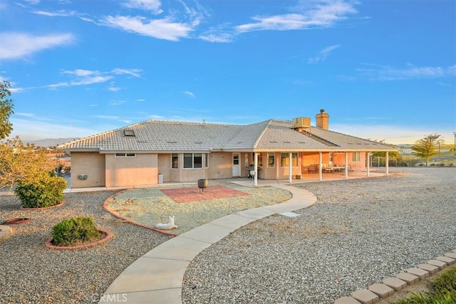 view of front of home with a patio