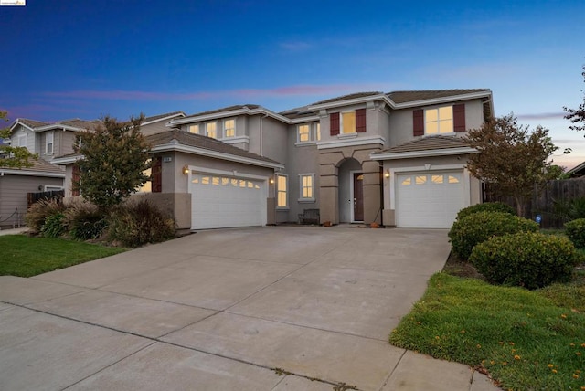 prairie-style home featuring a garage