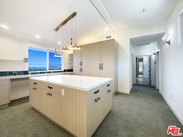 kitchen with carpet flooring, a center island, hanging light fixtures, and light brown cabinetry