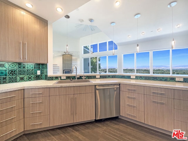 kitchen with dishwasher, backsplash, sink, ceiling fan, and dark hardwood / wood-style flooring