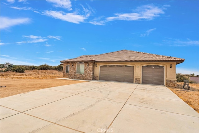 view of front of home featuring a garage