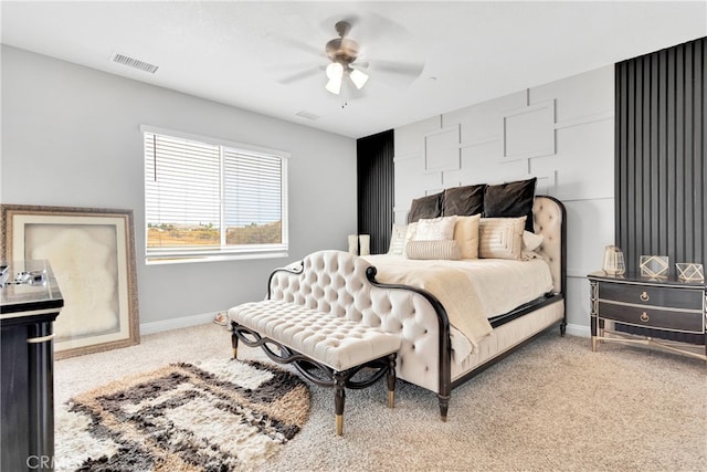 bedroom with ceiling fan and carpet flooring