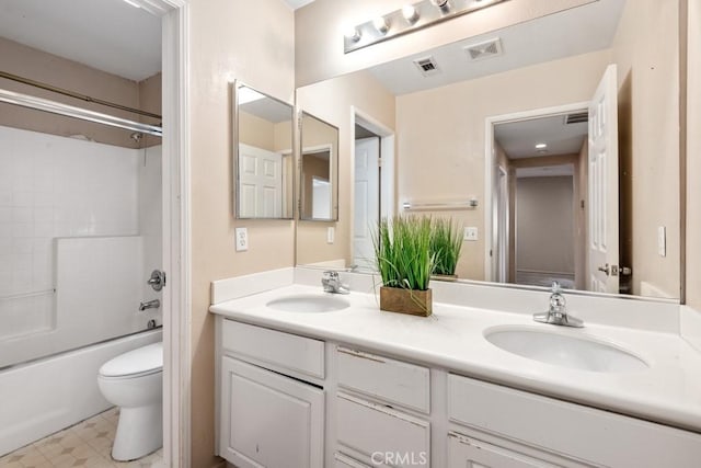 full bathroom featuring vanity, toilet, and shower / bath combination