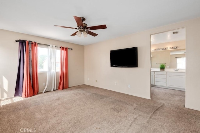 3688 Alhambra Ln, Perris, CA 92571 - unfurnished living room with light colored carpet and a ceiling fan