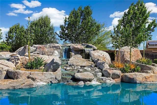 3688 Alhambra Ln, Perris, CA 92571 - view of swimming pool with a small pond