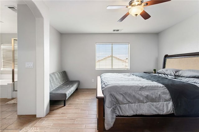 bedroom with ceiling fan and light hardwood / wood-style flooring