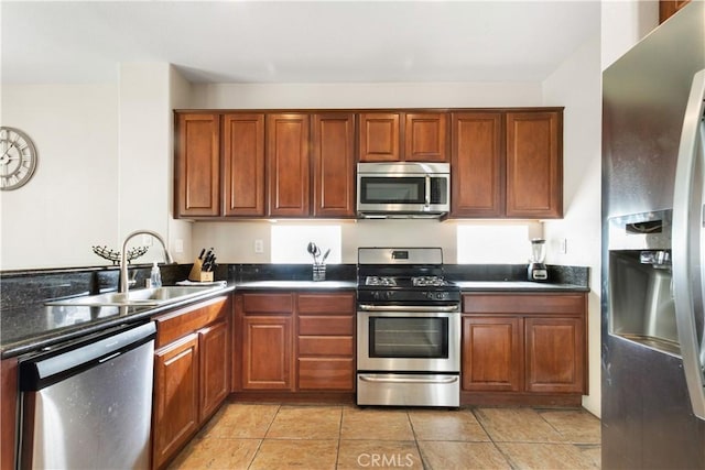 kitchen with appliances with stainless steel finishes and sink