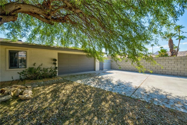 exterior space featuring a garage