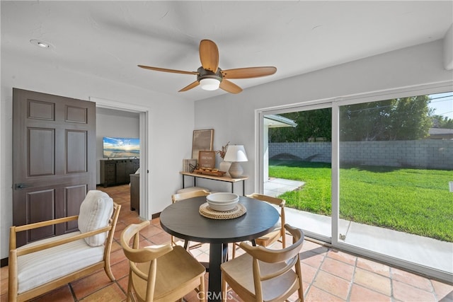 dining area with ceiling fan and plenty of natural light