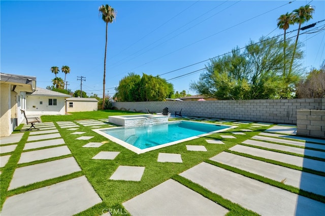 view of swimming pool with an in ground hot tub and a patio