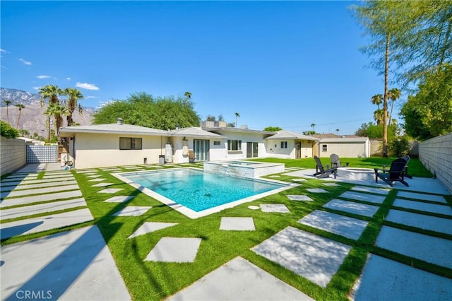 642 S Mountain View Dr, Palm Springs, CA 92264 - view of swimming pool with an outdoor fire pit, a patio area, and a pool with connected hot tub