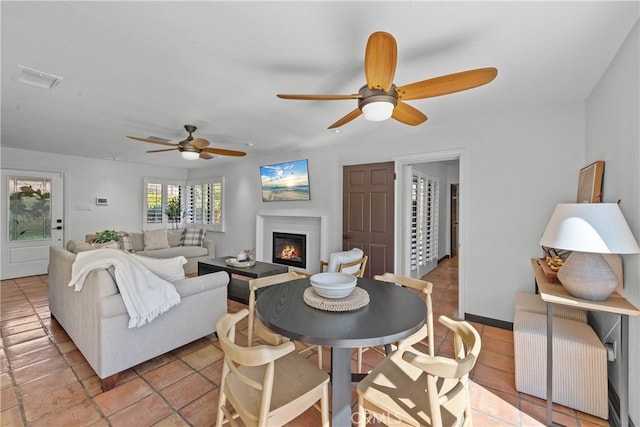 living room with ceiling fan