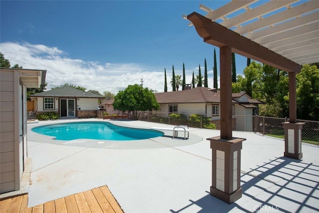 view of swimming pool featuring a pergola and a patio area