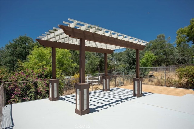 view of patio featuring a pergola