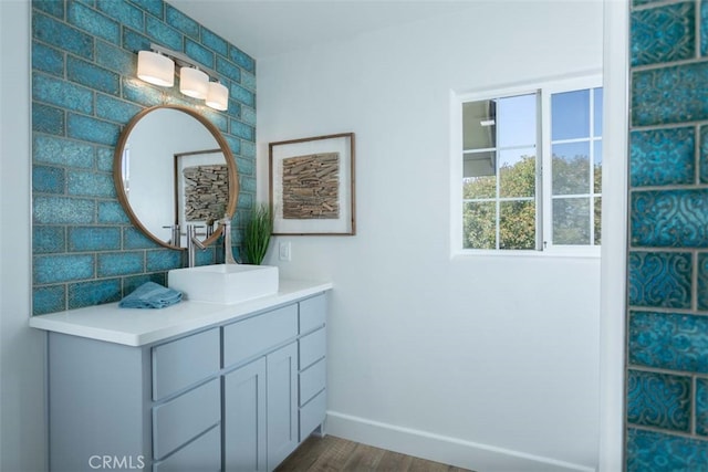 bathroom with vanity and hardwood / wood-style flooring