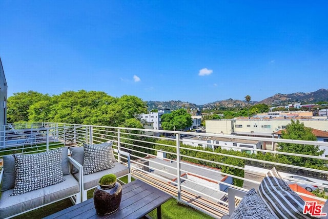 deck featuring a mountain view