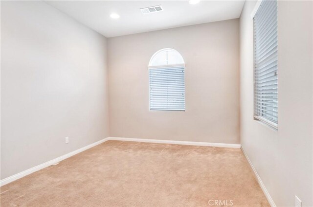 view of carpeted spare room