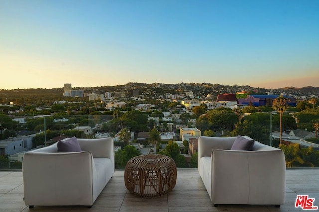 view of patio terrace at dusk