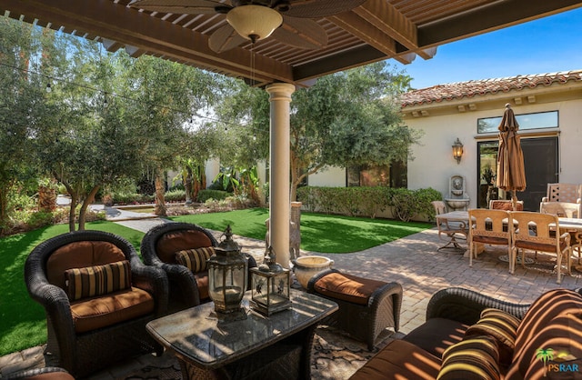 view of patio featuring ceiling fan