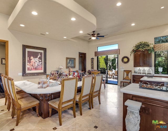 dining space featuring ceiling fan