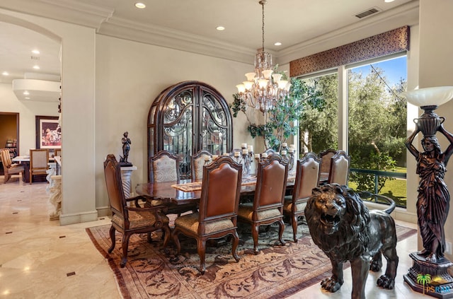 dining space featuring crown molding and a notable chandelier