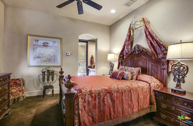 bedroom with dark colored carpet and ceiling fan