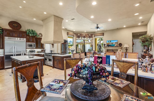 dining room featuring ceiling fan