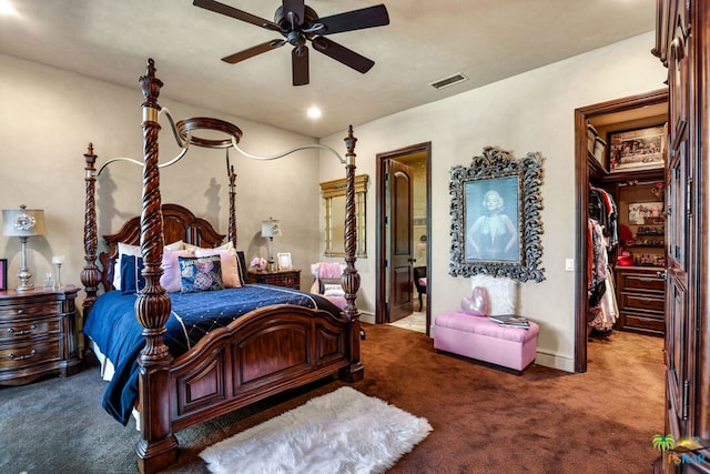 bedroom with carpet, ensuite bath, and ceiling fan