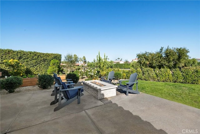 view of patio / terrace featuring a fire pit