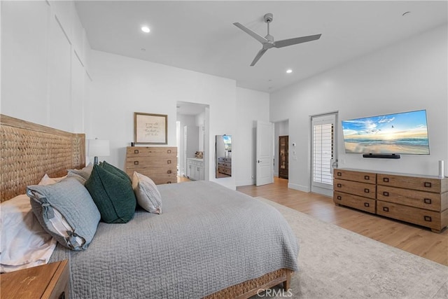 bedroom featuring ceiling fan and light hardwood / wood-style flooring