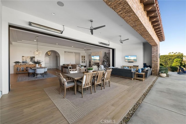 dining room featuring hardwood / wood-style flooring and ceiling fan