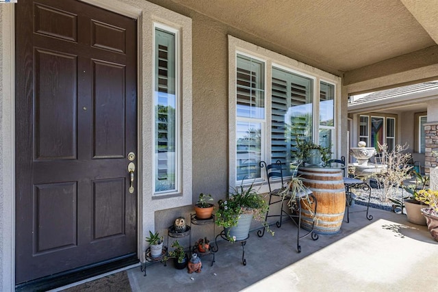 entrance to property with a porch