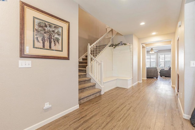 interior space with light wood-type flooring and ceiling fan