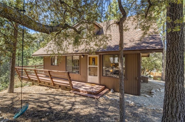 view of front of property featuring a wooden deck