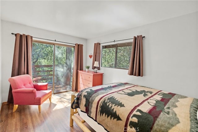 bedroom with light hardwood / wood-style floors