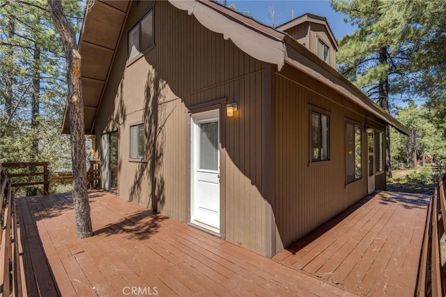 view of property exterior featuring a deck