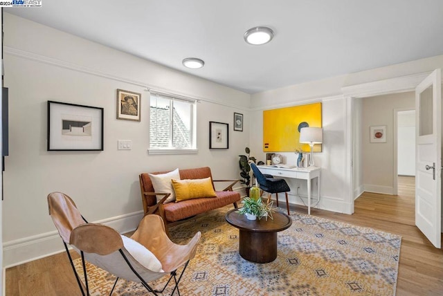 living area with light wood-type flooring