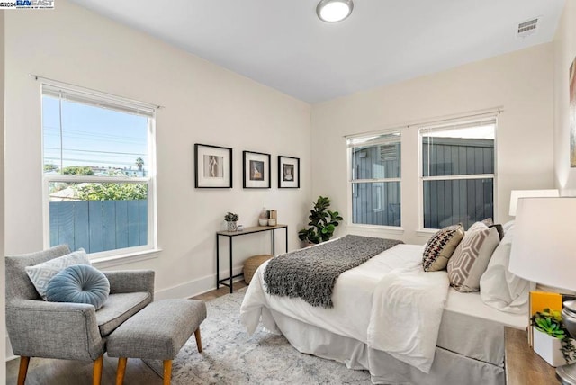 bedroom with wood-type flooring