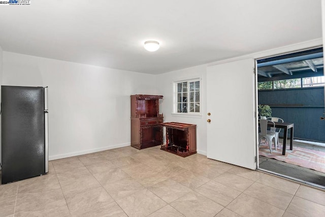 empty room with light tile patterned floors