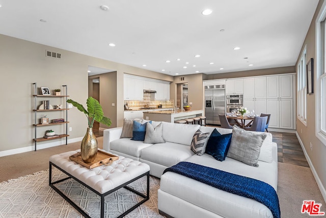 living room with light hardwood / wood-style floors