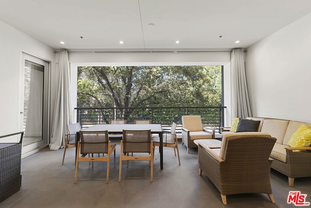 dining room featuring concrete floors