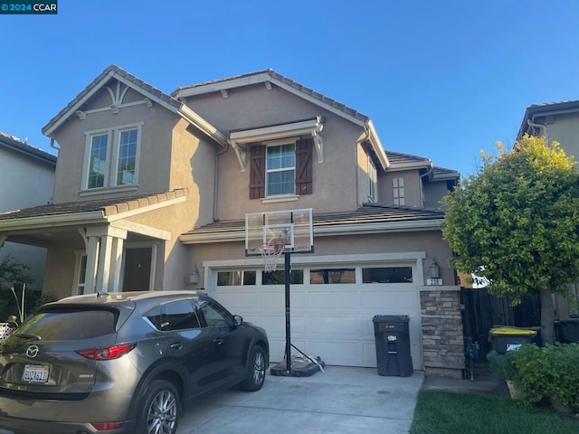 view of front of home with a garage