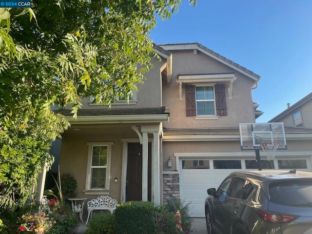 view of front of home with a garage