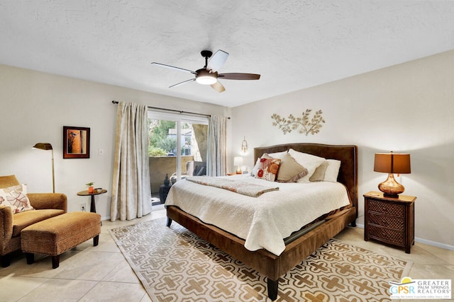 bedroom featuring ceiling fan, light tile patterned floors, a textured ceiling, and access to exterior