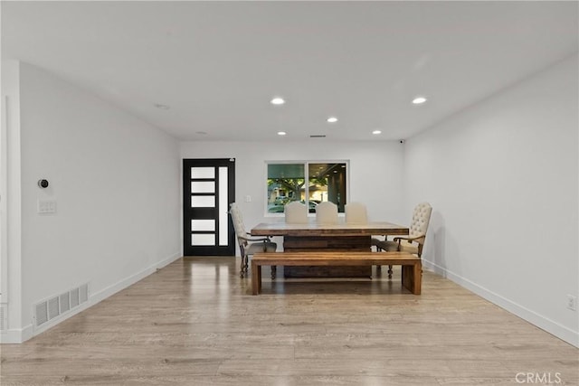 dining room featuring light hardwood / wood-style flooring