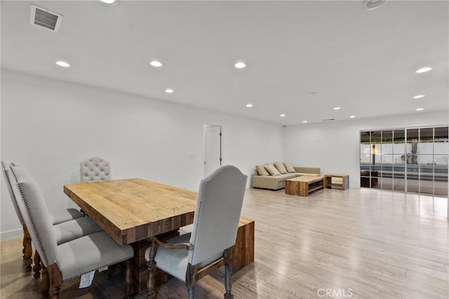 dining area with light wood-type flooring