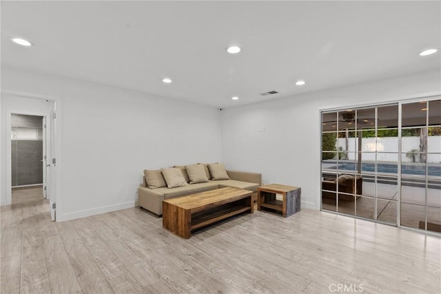 living room featuring light wood-type flooring