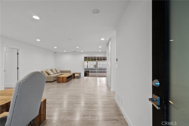 living room with light hardwood / wood-style floors