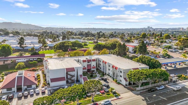 birds eye view of property with a mountain view