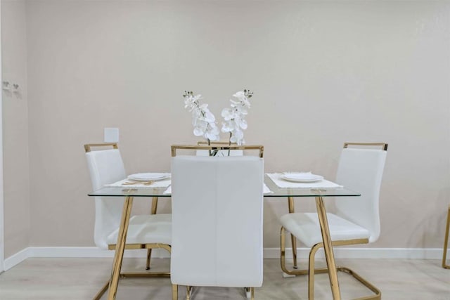 dining room with light hardwood / wood-style floors